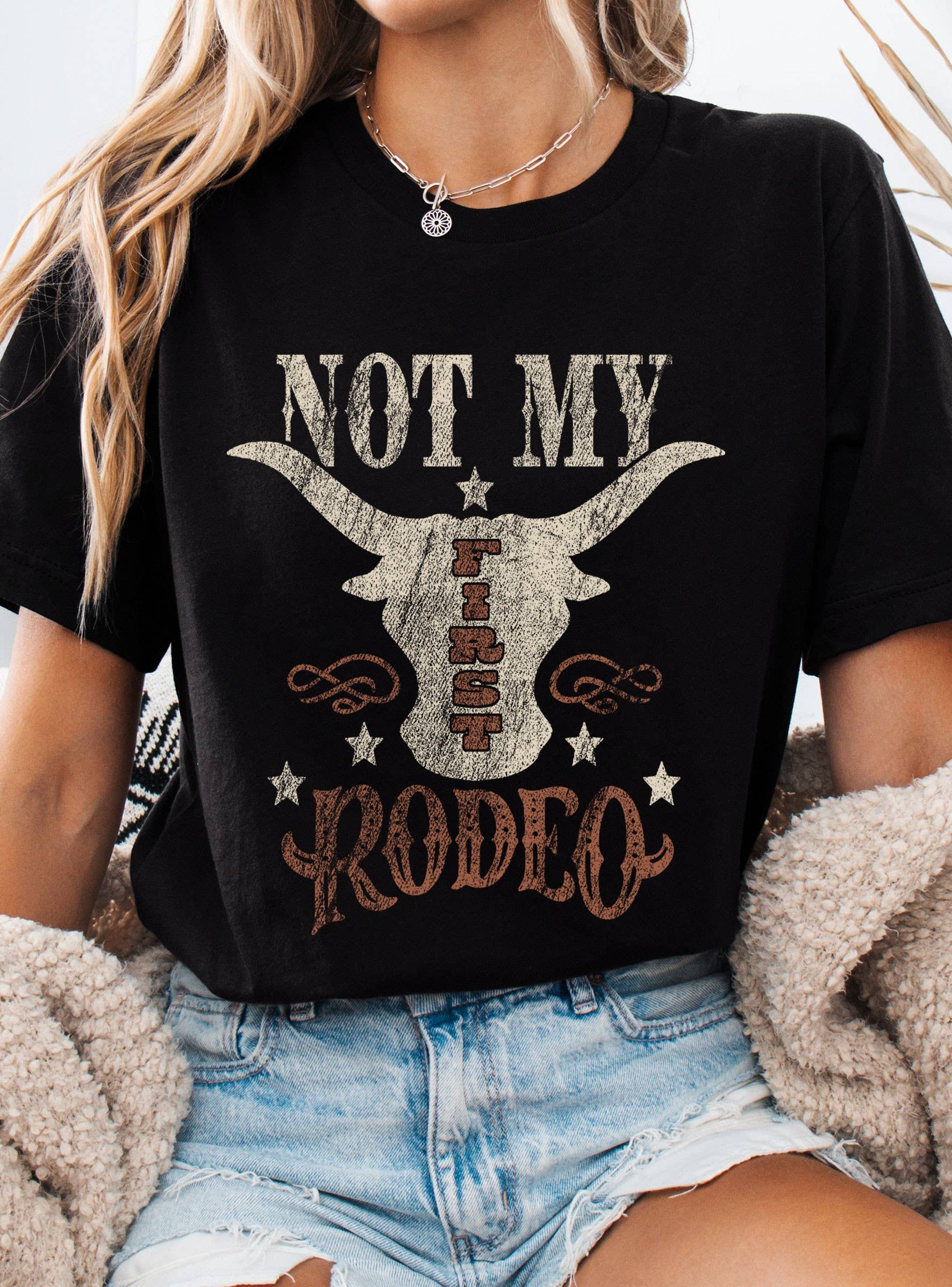 NOT MY FIRST RODEO COW GRAPHIC TSHIRTS