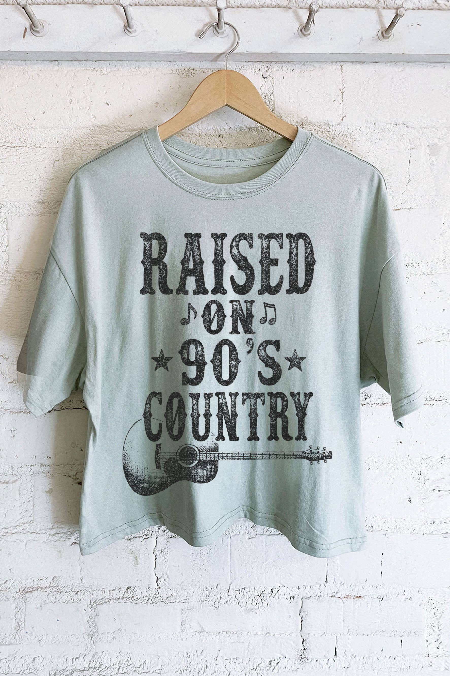 RAISED ON 90'S COUNTRY MUSIC GRAPHIC LONG CROP TOP